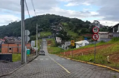 Terreno em condomínio fechado à venda na rua homero de miranda gomes, 1411, fundos, biguaçu, 150 m2 por r$ 185.000