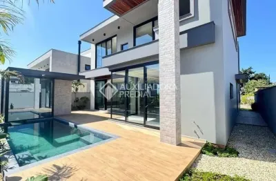 Casa em condomínio fechado com 4 quartos à venda na rua lagoinha, 65, pedra branca, palhoça, 301 m2 por r$ 3.800.000