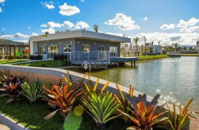 Terreno em condomínio fechado à venda na avenida deltaville, 360, beira rio, biguaçu, 150 m2 por r$ 218.000