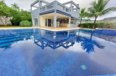 Linda casa, com 6 suítes, 560 m² de área construída, piscina, enseada
