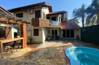 Casa à venda em são leopoldo, bairro pinheiro - com sacada, churrasqueira e piscina