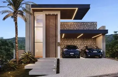 Casa moderna em fase de acabamento no condomínio aruã brisas - porteira fechada