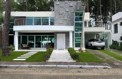 Casa em condomínio para venda no bairro praia de atlântida em xangri-lá