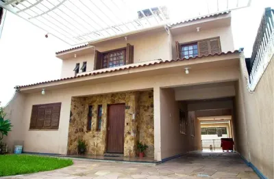 Casa com 3 quartos à venda na Rua Princesa Isabel, 735, Sumaré, Alvorada