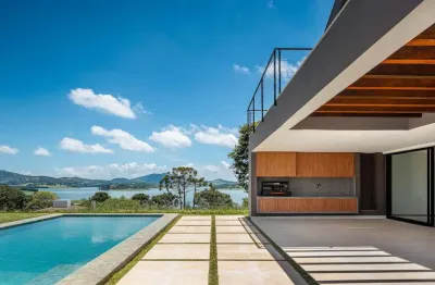 Seja bem-vindo a uma joia de luxo e tranquilidade, a Casa Celeiro à beira da deslumbrante represa JaguarÍ, por Rafael Stenico.