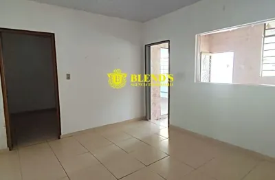 Casa  com entrada independente e barracão com renda de aluguel  .