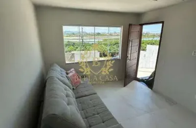 Casa duplex com 2 suítes em condomínio fechado por r$ 2.500,00/mês - guriri - cabo frio/rj