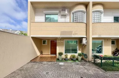 Casa em condomínio fechado com 2 quartos à venda na Rua Sinke Ferreira, 1080, Jardim das Américas, Curitiba, 164 m2 por R$ 1.030.000