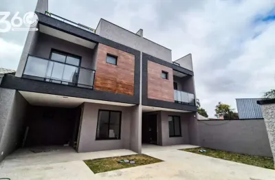 Sobrado com belo terraço, cozinha ampla e churrasqueira