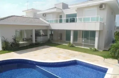 Casa em condomínio fechado portal do paraíso ii, permuta, aquecimento solar, planejados, piscina.