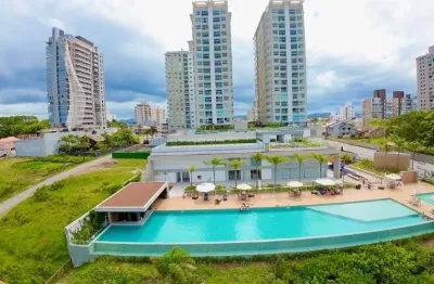 Apartamento frente mar com 4 dormitorios semi mobiliado pé na areia