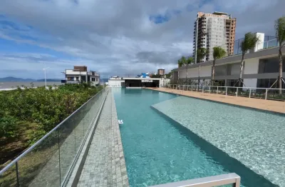 Apartamento pe na areia com uma mega estrutura de lazer , com valor abaixo de mercado