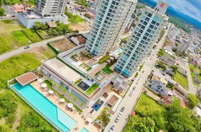 Apartamento em condominio pe na areia dois quartos sendo uma suite