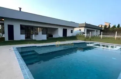Casa térrea nova, à venda, 3 suítes, escritório, piscina, condomínio terras de itaici, indaiatuba.