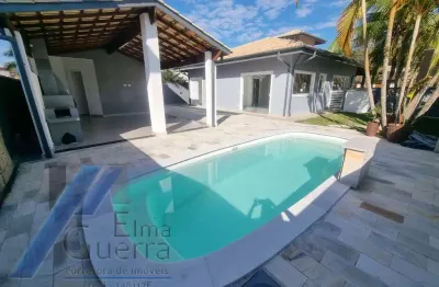 Ubatuba - condomínio ubatuba country, casa com 03 suítes e área de lazer.