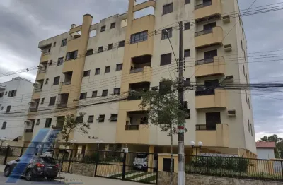 Ubatuba, itagua - apartamento com 02 dormitórios sendo 01 suite com elevador.