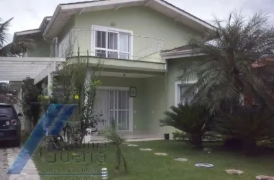 Ubatuba, condomínio ubatuba country - casa com 05 suítes e área de lazer.