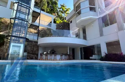 Ubatuba, praia vermelha do sul - casa alto padrão, com terreno de 5.000 m2, com 04 suites e vista para o mar.