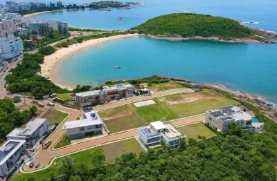 Lote de 551m2 no condômino alto da bacutia em guarapari .