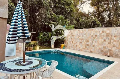 Casa em condomínio fechado com 5 quartos à venda na alameda junco, --, riviera, bertioga por r$ 3.700.000