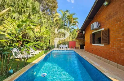 Casa em condomínio fechado com 3 quartos à venda na alameda junco, --, riviera, bertioga por r$ 2.700.000