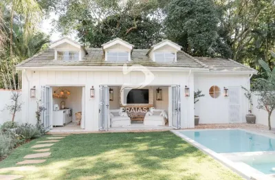 Casa com 4 quartos à venda na alameda caiaue, --, riviera, bertioga por r$ 12.600.000