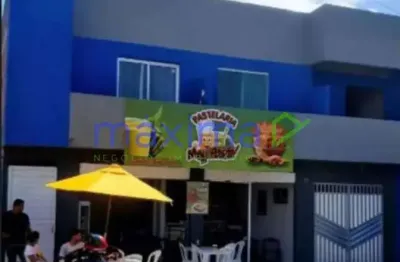 Excelente oportunidade de investimento! casa 3/4 com suite e prédio comercial na frente