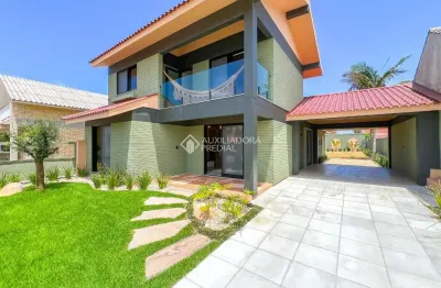 Casa com 4 quartos à venda na rua rio carreiro, 1059, centro, xangri-lá, 243 m2 por r$ 1.980.000