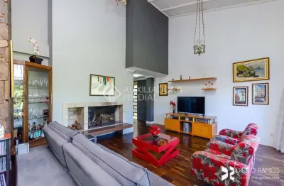 Casa com 3 quartos à venda na rua gustavo schmidt, 20, três figueiras, porto alegre, 313 m2 por r$ 2.100.000