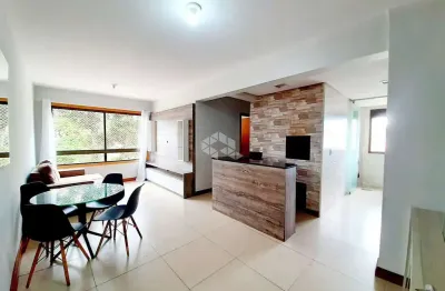 Apartamento semi-mobiliado à venda, com 3 dormitórios, 1 suíte, churrasqueira e vaga de garagem