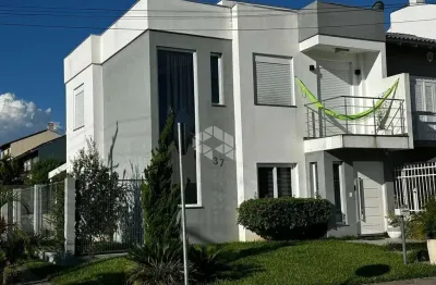 Casa com 2 quartos à venda na Rua Louro, 37, Hípica, Porto Alegre