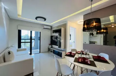 Ótimo apartamento à venda com 02 dormitórios com suíte, sacada com churrasqueira e garagem coberta, no bairro uglione em santa maria.