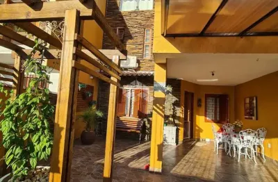 Casa com 4 quartos à venda na Rua Baldoino Bottini, 392, Hípica, Porto Alegre