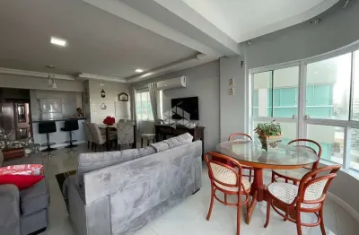 Apartamento mobiliado com 117m² de 03 dormitórios e 02 vagas de garagem em capão da canoa