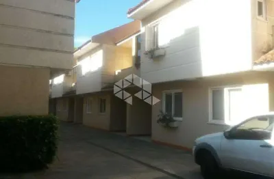 Casa em condomínio fechado com 3 quartos à venda na Avenida Orleaes, 638, Guarujá, Porto Alegre