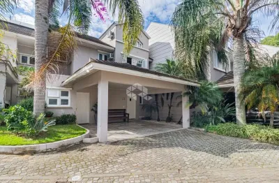 Casa em condomínio fechado com 3 quartos à venda na Avenida Coronel Marcos, 483, Pedra Redonda, Porto Alegre
