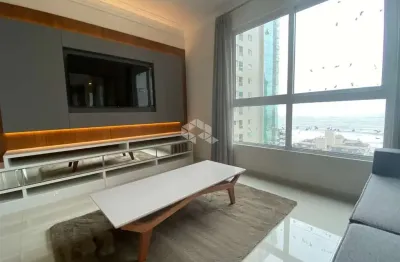 Apartamento mobiliado com três quartos na Meia Praia Itapema SC