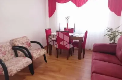 Apartamento semimobiliado com 3 dormitórios, uma suíte, living para dois ambientes,