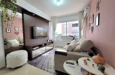 Apartamento semi mobiliado de 02 dormitórios com 50m² privativos com vaga próximo ao partenon