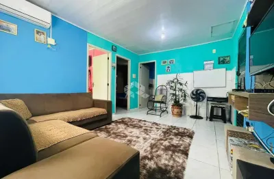 Casa com 02 dormitórios e vaga de garagem no Bairro Diácono Luiz Pozzobon em Santa Maria