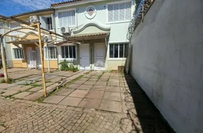 Casa em condomínio com 2 dormitórios, aceita financiamento no bairro rio branco/canoas -rs.
