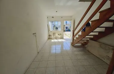 Casa em condomínio com 2 dormitórios, aceita financiamento no bairro rio branco/canoas -rs.