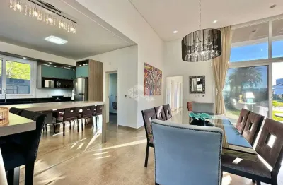 Casa térrea 4 dormitórios no condomínio lagoa do passo, em xangri-lá/rs.