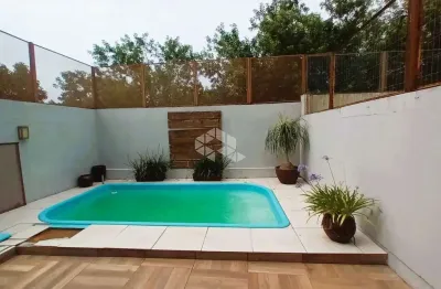 Casa com 3 quartos à venda na Rua Professor Henrique Desjardins, 154, Espírito Santo, Porto Alegre