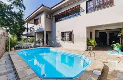 Excelente casa com 03 dormitórios, piscina, salão de festas, bairro sétimo céu em porto alegre.