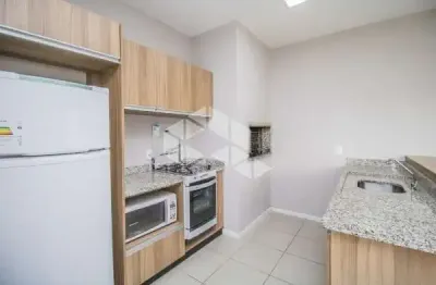 Apartamento semi mobiliado de 02 dormitórios com 50m² privativos com vaga próximo ao partenon