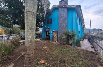 Casa com 4 quartos à venda na Rua Jacipuia, 10, Guarujá, Porto Alegre