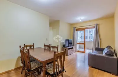 Apartamento com 3 dormitórios e garagem coberta, no bairro camaquã.