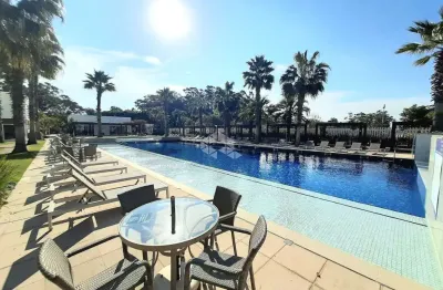 Apartamento à venda em atlântida, xangri-lá, com 3 quartos (1 suíte), 132m² e infraestrutura de resort