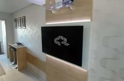 Sobrado triplex semimobiliado com 63m ,2 dormitorios , 2 banheiros ,vaga pra 2 carros e uma cozinha na garagem nno bairro desvio rizzo